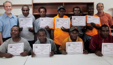 Norm Weatherhead and Jim Bliffen with graduates of PBT-PNG’s Computer/Paratext 2 Workshop 